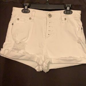 White high-waisted Jean shorts with rips